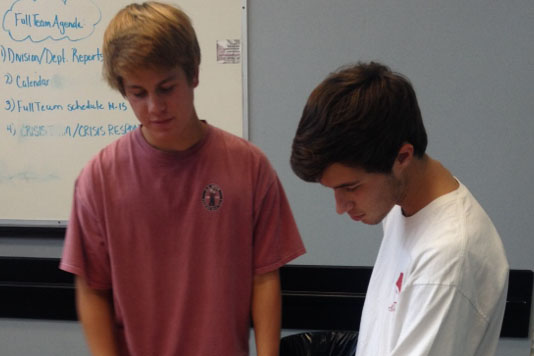 Davis Brown (left) and Colby Kirkpatrick (right) discuss plans for the school year.