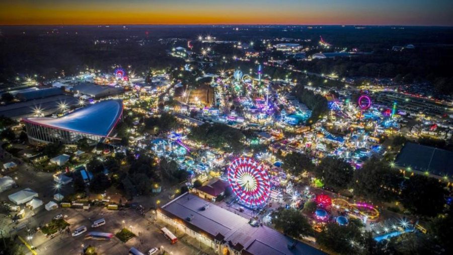The N.C. State Fair from the air on a beautiful fall night Tuesday, Oct. 17, 2017. Official fair rules prohibit drone flights over any fair property, including parking lots. This photograph was made from off of fair property by an FAA certified drone pilot. Tuesdays attendance at the N.C. State Fair was 76,844, compared with 75,995 last year. The 10-year average for Tuesday is 72,516.