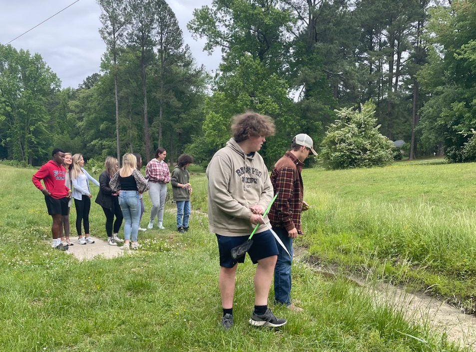 Mrs. Lehnes class enjoys a nature walk behind campus.